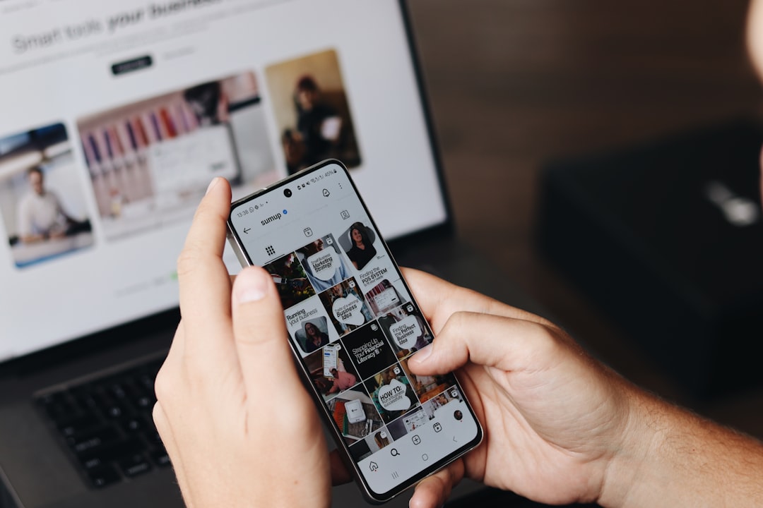 Smartphone and social media workspace representing creator fan engagement